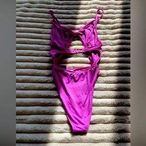 Pink one piece swimsuit. Worn only a few times Dippin’ Daisys swimwear